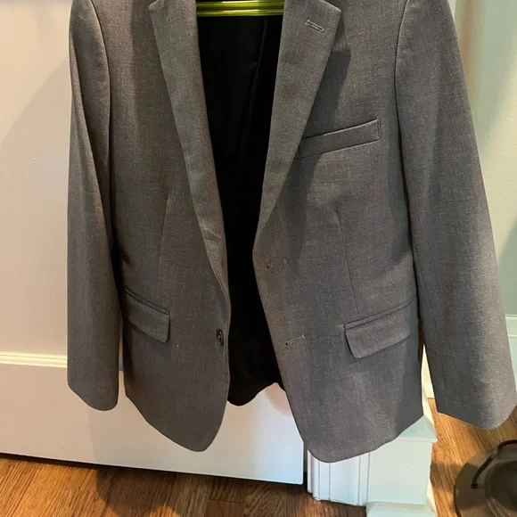 Boys slim stretch fit Calvin Kline gray suit. Size 12 pants/ 14 jacket
